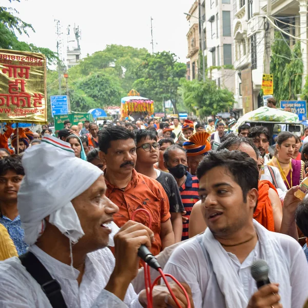 New Delhi, India July 01 2022 - A huge gathering of devotees from different parts of Delhi on the occasion of ratha yatra or rathyatra. Rath for Lord Jagannath pulled by people, Jagannath Rath Yatra