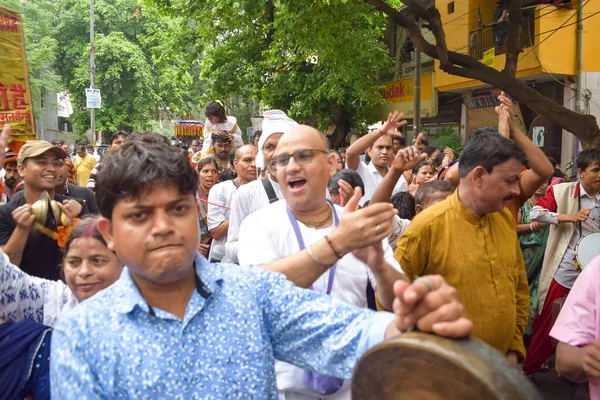 New Delhi, India July 01 2022 - A huge gathering of devotees from different parts of Delhi on the occasion of ratha yatra or rathyatra. Rath for Lord Jagannath pulled by people, Jagannath Rath Yatra