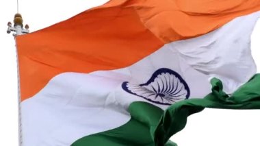 India flag flying high at Connaught Place with pride in blue sky, India flag fluttering, Indian Flag on Independence Day and Republic Day of India, tilt up shot, Waving Indian flag, Har Ghar Tiranga