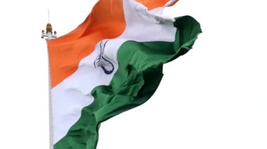 India flag flying high at Connaught Place with pride in blue sky, India flag fluttering, Indian Flag on Independence Day and Republic Day of India, tilt up shot, Waving Indian flag, Har Ghar Tiranga