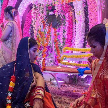 New Delhi, India - Auguest 13, 2022 : Cute Indian dressed up as Lord Krishna and Radha on the occasion of Krishna Janmastami Festival in Delhi India, Radha Krishna performance on Janmashtami festival