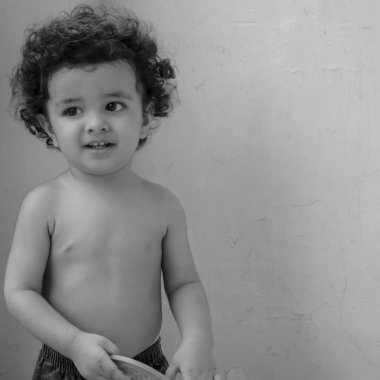 Cute little boy Shivaay sapra at home balcony during summer time, Sweet little boy photoshoot during day light, Little boy enjoying at home during photo shoot Black and White