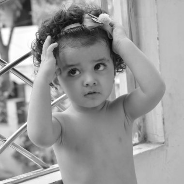 Cute little boy Shivaay sapra at home balcony during summer time, Sweet little boy photoshoot during day light, Little boy enjoying at home during photo shoot Black and White