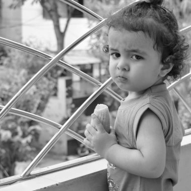 Cute little boy Shivaay sapra at home balcony during summer time, Sweet little boy photoshoot during day light, Little boy enjoying at home during photo shoot Black and White