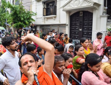 New Delhi, India July 01 2022 - A huge gathering of devotees from different parts of Delhi on the occasion of ratha yatra or rathyatra. Rath for Lord Jagannath pulled by people, Jagannath Rath Yatra