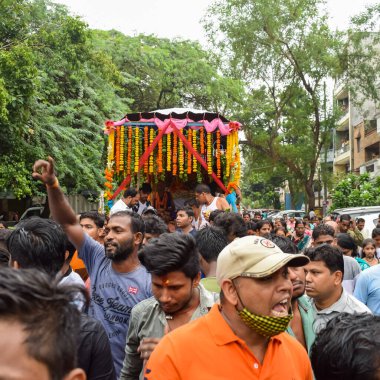 New Delhi, India July 01 2022 - A huge gathering of devotees from different parts of Delhi on the occasion of ratha yatra or rathyatra. Rath for Lord Jagannath pulled by people, Jagannath Rath Yatra