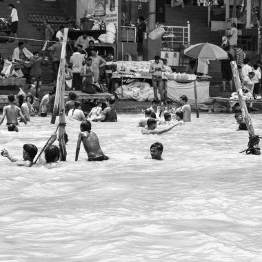 Garh Mukteshwar, UP, India, June 11 2022 -People are taking holy dip on the occasion of Nirjala Ekadashi, A view of Garh Ganga Brij ghat which is very famous religious place for Hindus-Black and White