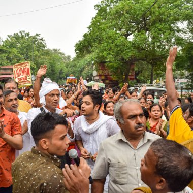 New Delhi, India July 01 2022 - A huge gathering of devotees from different parts of Delhi on the occasion of ratha yatra or rathyatra. Rath for Lord Jagannath pulled by people, Jagannath Rath Yatra