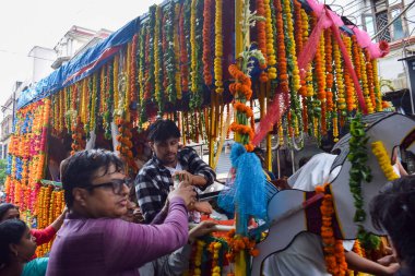 New Delhi, India July 01 2022 - A huge gathering of devotees from different parts of Delhi on the occasion of ratha yatra or rathyatra. Rath for Lord Jagannath pulled by people, Jagannath Rath Yatra