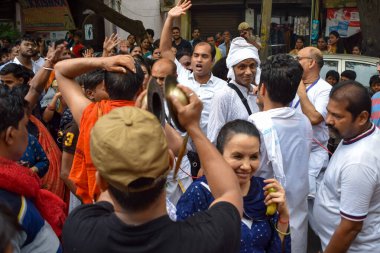 New Delhi, India July 01 2022 - A huge gathering of devotees from different parts of Delhi on the occasion of ratha yatra or rathyatra. Rath for Lord Jagannath pulled by people, Jagannath Rath Yatra