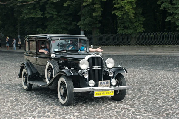 Vintage oldsmobile auto retrò gara leopolis grand prix — Zdjęcie stockowe