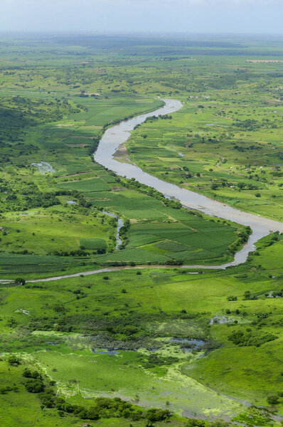 Agriculture advances and clears the riparian forest of the Paraiba River in Sobrado, Paraiba, Brazil on July 2, 2008. Aerial view. — Stock Image Agriculture Advances Clears Riparian Forest Paraiba River Sobrado Paraiba Brazil Stock Photo