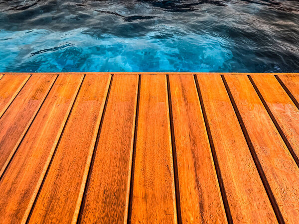 Wooden deck by the pool in close up for background. — Stock Image Wooden Deck Pool Close Background Royalty Free Stock Photos