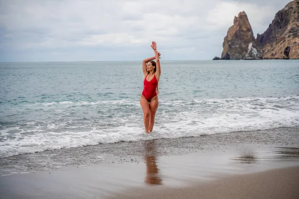 Beautiful Sexy Brunette Red Swimsuit Pebble Beach Running Shore Foam — Stock Photo, Image