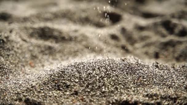 Sand Pouring Slowly Background Golden Bokeh Sunset Light Slow Motion — Stock Video
