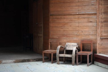 Lanna Chairs with Thai style House in Chiangmai, Thailand.