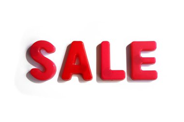 Kırmızı harflerle yazılmış yazı satılıyor. Sıcak satış.