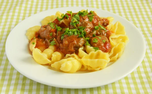 Meatballs with parsley and gnocchi pasta — Stock Photo, Image