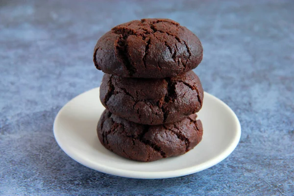 Homemade brownie cookies on the plate. Chocolate crack cookies on the plate. Sweet  cookies with dark chocolate.