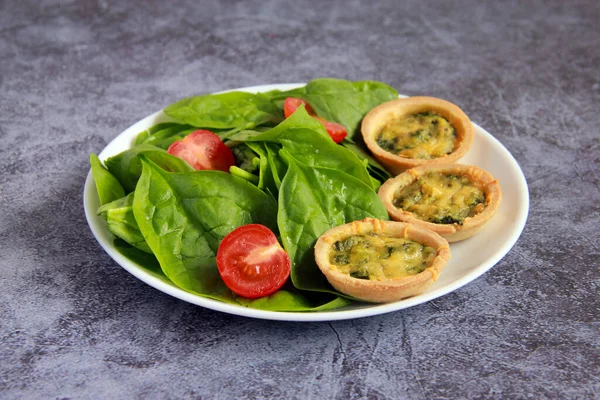 Fourchette Tartlets Filled Cheese Spinach White Plate Delicious Hot Appetizer — стоковое фото