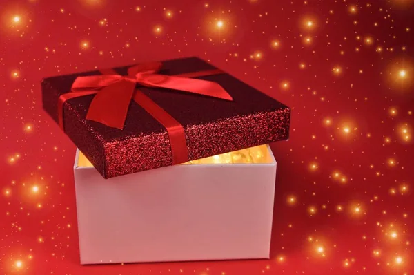 Red present box with bow. Gift for Christmas