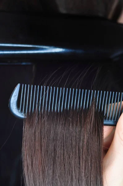 Combing Hair Hairbrush Macro View Copy Space High Quality Photo — стоковое фото