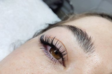 Eyelash extensions in beauty salon macro eye Kim effect 