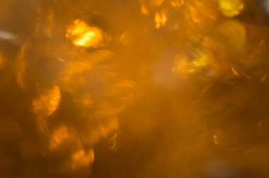 Altın bokeh odaklanmış arkaplan kopyalama alanı