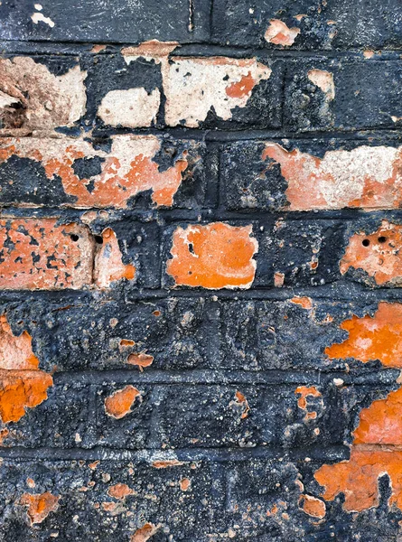 Old Peeled Paint Blue Orange Brick Wall Background Copy Space — стоковое фото