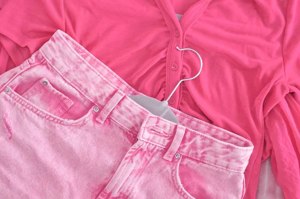 Pink woman\'s clothes in fitting room ,summer and spring look for girls. High quality photo