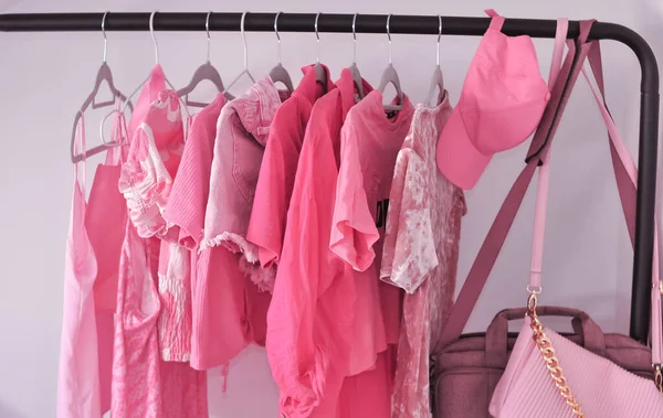 Pink woman\'s clothes in fitting room ,summer and spring look for girls. High quality photo