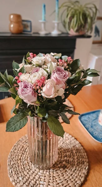 Close up of fresh pink,white and violet roses bouquet, gift for women . High quality photo