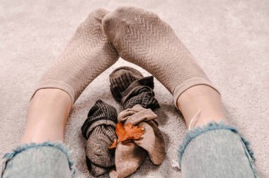 Close up of brown cotton socks autumn cozy clothing.