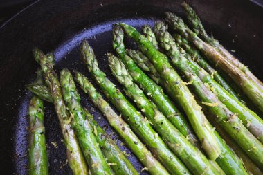 Asparagus Grilled in a Cast Iron Skillet at a Summer Outdoor BBQ