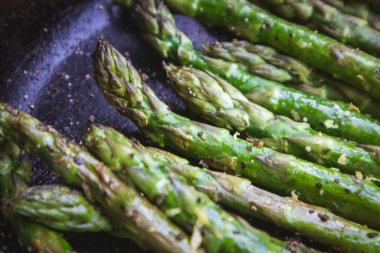 Asparagus Grilled in a Cast Iron Skillet at a Summer Outdoor BBQ