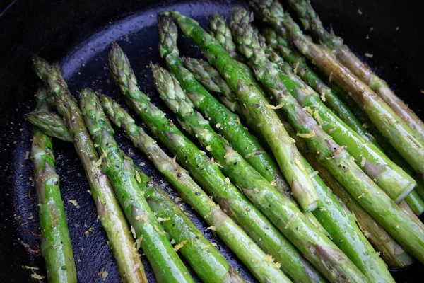 Asparagus Grilled in a Cast Iron Skillet at a Summer Outdoor BBQ