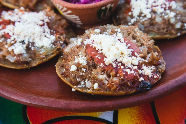 Garnachas on the table at an Oaxacan restaurant in Oaxaca, Mexico - Close up