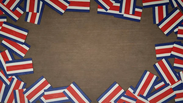 Kosta Rika Nın Kağıt Bayraklarından Yapılmış Çerçeve Ahşap Masaya Dizilmiş — Stok fotoğraf
