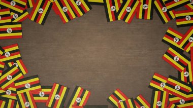 Tahta masaya dizilmiş Uganda 'nın kağıt bayraklarından yapılmış çerçeve. Ulusal kutlama konsepti. 3B illüstrasyon