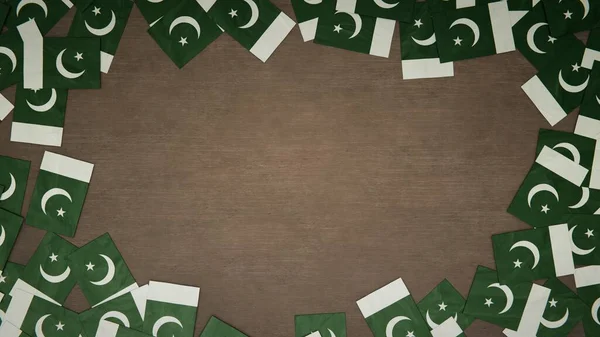 Rahmen Aus Papierfahnen Pakistans Arrangiert Auf Einem Holztisch Nationales Feierkonzept — Stockfoto