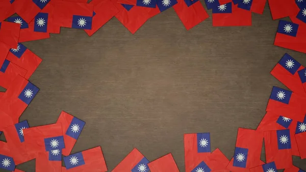 Frame made of paper flags of Taiwan arranged on wooden table. National celebration concept. 3D illustration