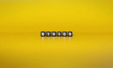 Kelime Ahlakı beyaz metinlerle yazılıyor. Koyu tahta bloklar üzerinde, düz sarı arkaplan üzerinde.