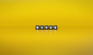 Sözcük İkramiyesi beyaz metinlerle yazılıyor, koyu tahta bloklar üzerinde, düz sarı arkaplan üzerinde.