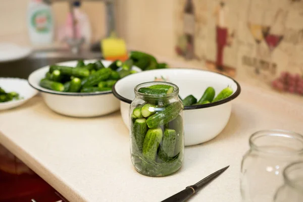 Home canning of organic vegetables. Preparing cucumbers