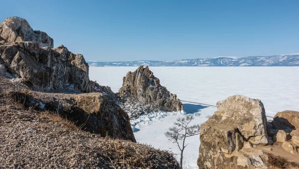 Picturesque Granite Rocks Baikal Background Frozen Lake Snow Ice Dry — стокове фото