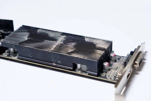 Dirty dusty graphics card in dust on a white background — Stock Photo, Image