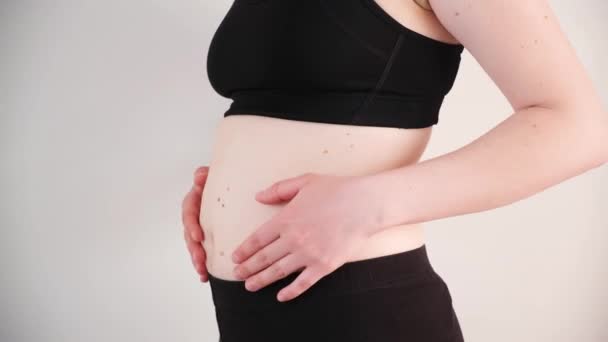 Woman Pats Herself Belly Shows Thick Belly Close — Stock Video