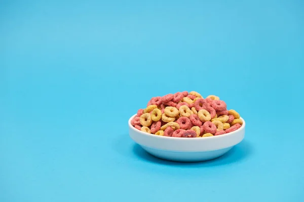 Quick Cereal Breakfast Form Rings Plate Blue Background — Stock Photo, Image