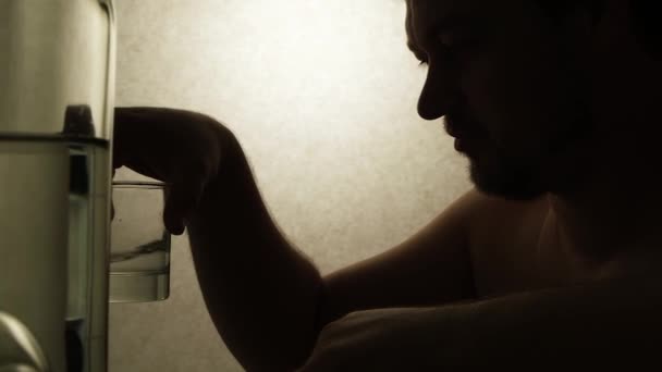 Alcoholic Man Drinking Vodka Sitting Table Bottles Silhouette Video — ストック動画