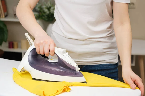Housewife Irons Yellow Shirt Iron Ironing Clothes Home Caring Clothes — ストック写真